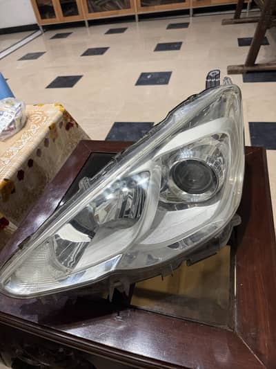 Aqua headlight 2015