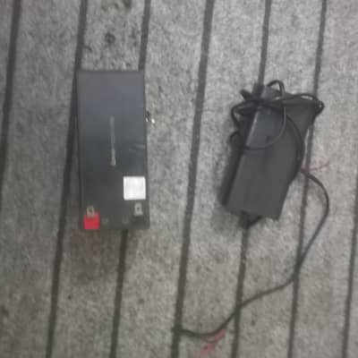 12 volts.      7Ah battery  with smart fast charger
