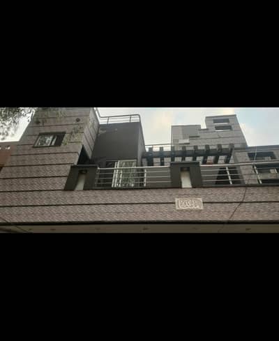 5.5 Marla triple story double unit house in Khuda bux colony airport road