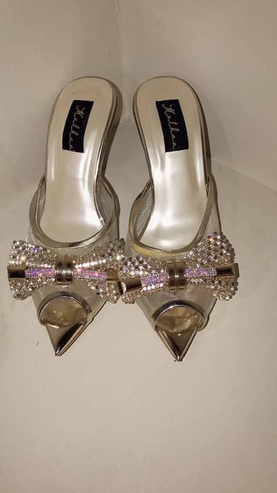 Trending heels golden with crystal bow