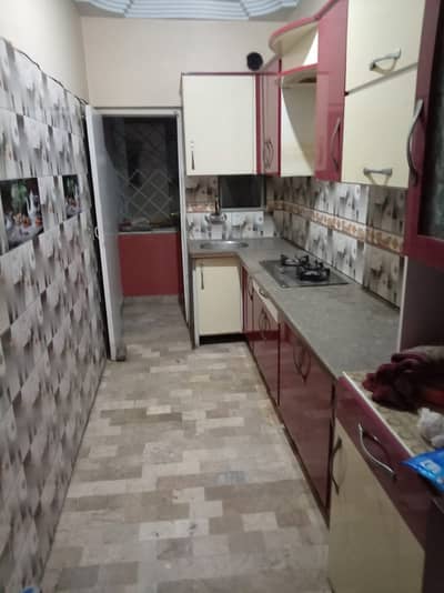 Olimpic Tower 800 square feet Gulshan Iqbal Block 11.4th Floor 2 Bed DD Pani, light,Gas Available boundary Wall project  No lift Demand 90 Lac *Code(16706)*