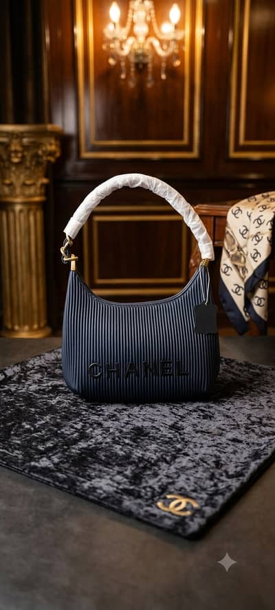 Chanel Ribbed Curved Hobo Bag – Deep Navy & Gold
