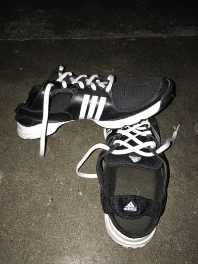 Adidas’s Traxion (golf shoes)
