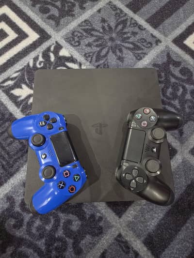 PlayStation ps4 slim 1tb with 2 controller