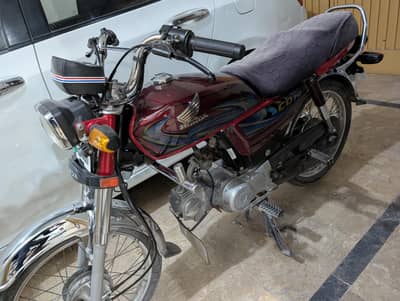 Honda CD 70 red colour