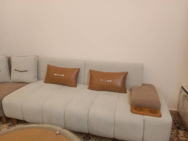 L shape sofa EIGHT sitter with table 1