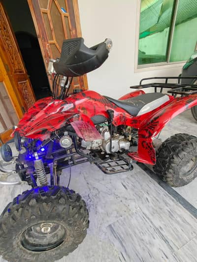 150cc 4-stroke quad ATV bike, powerful off-road.