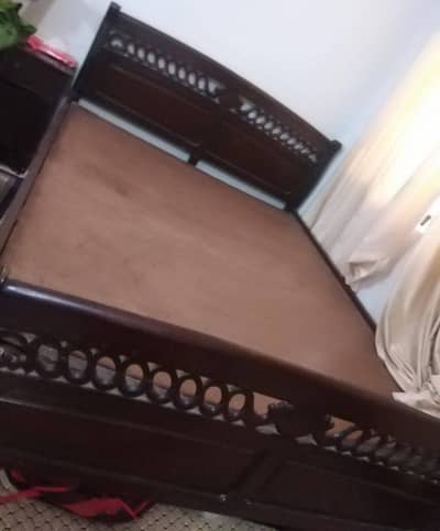 Queen bed for sale in very good condition without mattress