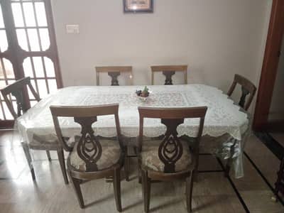 Glass top dining table with 6 chairs