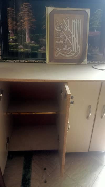 kids wardrobe and a iron stand