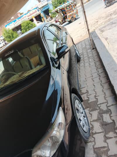 Toyota Corolla GLI 2010 bonat chatt Digi genuine