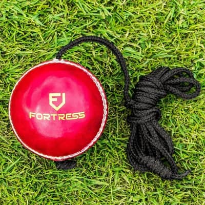 Red Leather Cricket Ball with Rope Attached