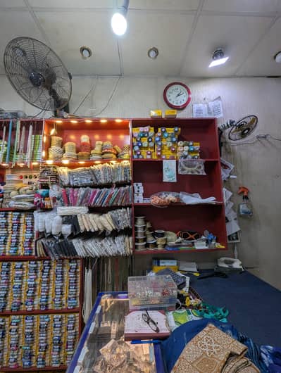 Complete Lace Shop Material with Shelves & Counters for Urgent Sale