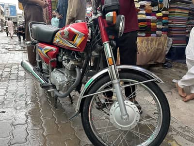 Urgent sale honda 125 total ganam