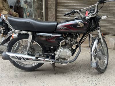 Honda 125 In Black Neat Clean