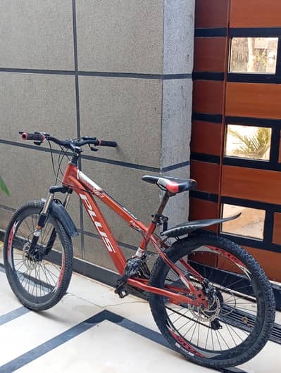 Red cycle with gears - excellent condition