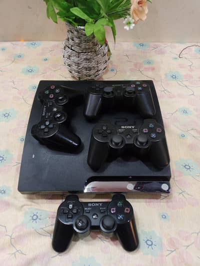 playstation 3 with 4 controllers
