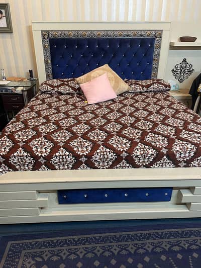 King size bed with side tables. (velvet posish). Dressing table.