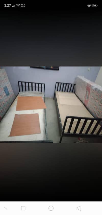 Two Single Iron Beds without Matters