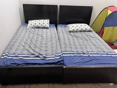 2 single beds with mattress good condition
