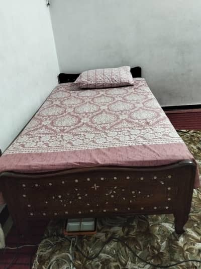 wooden single bed