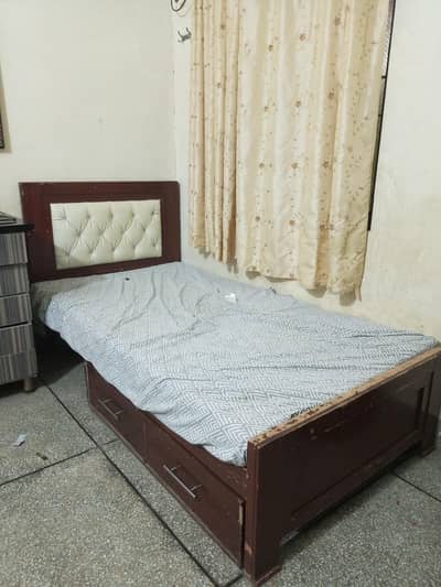 bed with mattress and draw