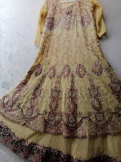 Elegant Mustard yellow heavy embroidered Maxi frock