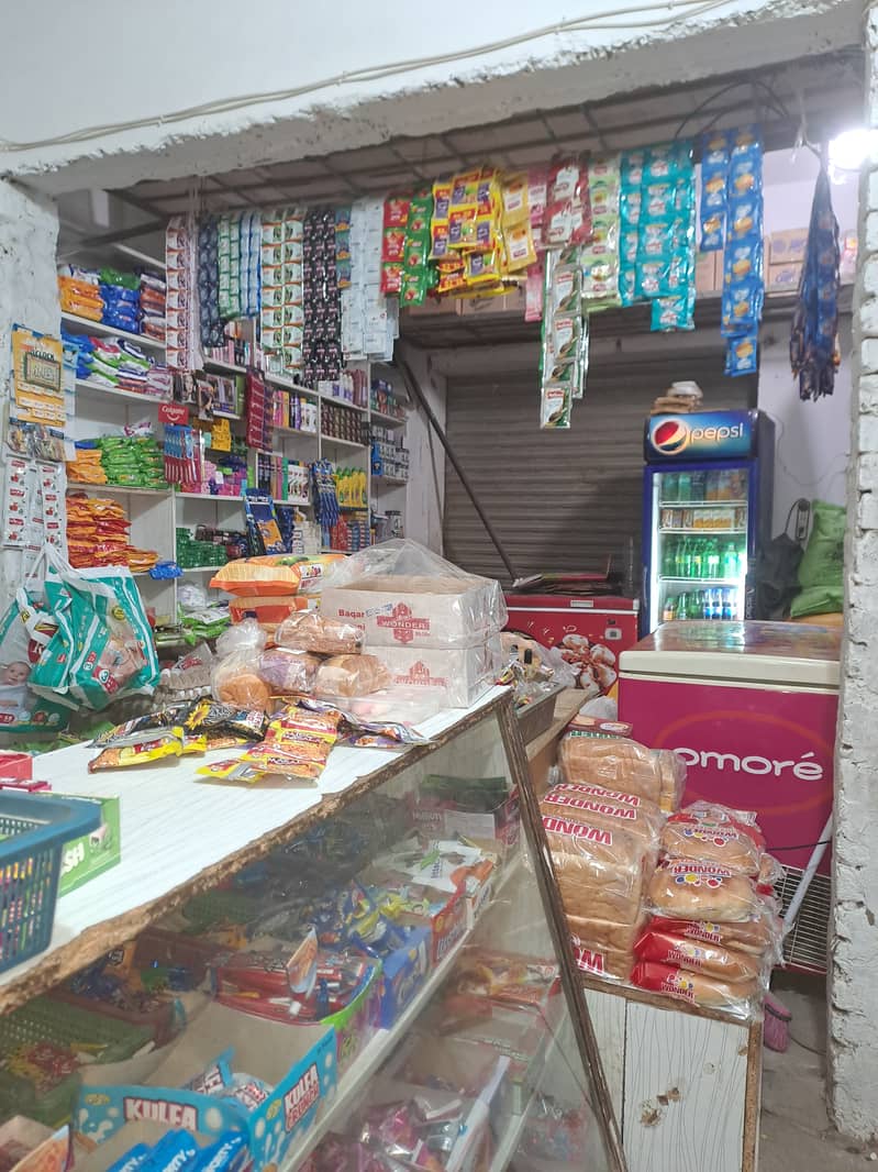 کریانہ سٹور برائے فروخت بڑی تین شٹر دوکان 3