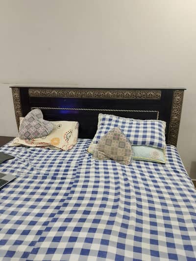 king sized double bed, bed side tables, spring mattress included