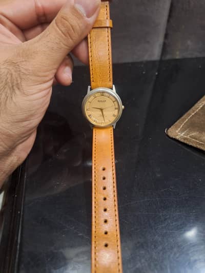 omax quartz vintage watch