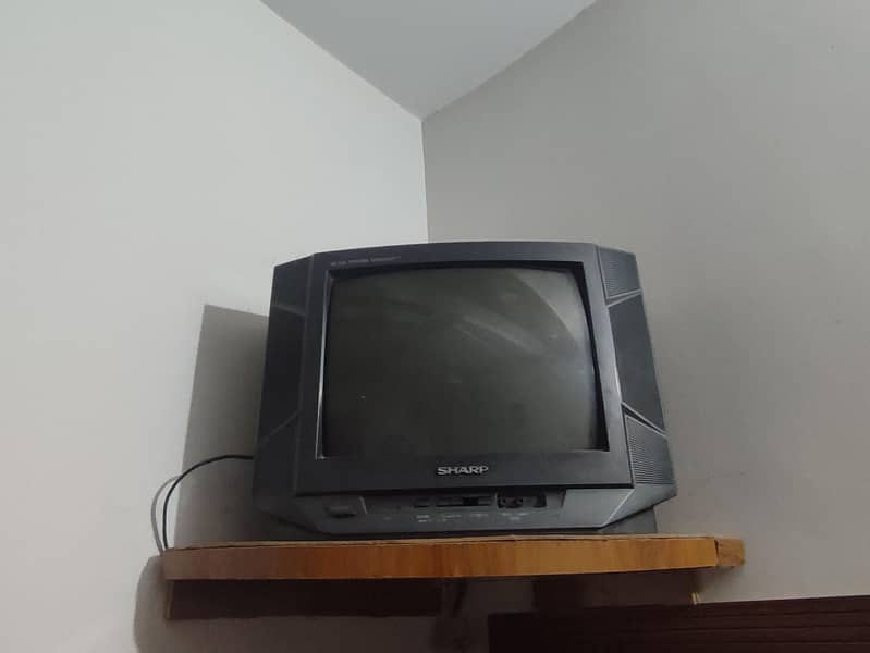 SHARP 14 INCH COLORED TV 1