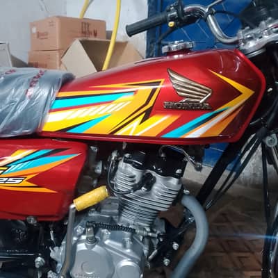Honda 125 2026 model karachi number excellent and zero metter