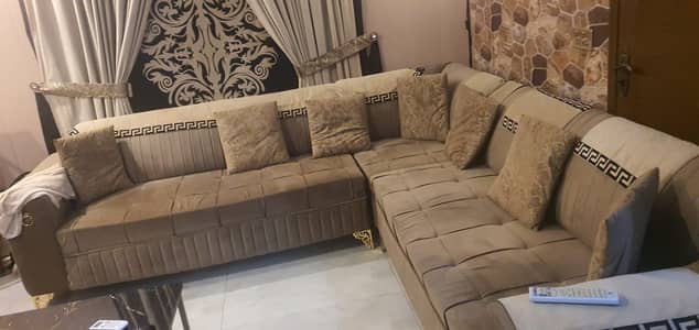 7 seater almost New L shape Sofa