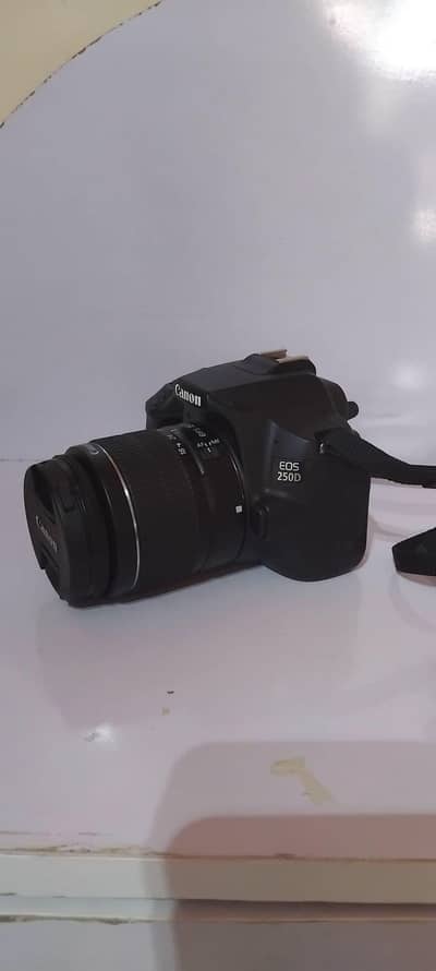canon 4k dslr 250d camera with 18-55mm kit lens for professional use.