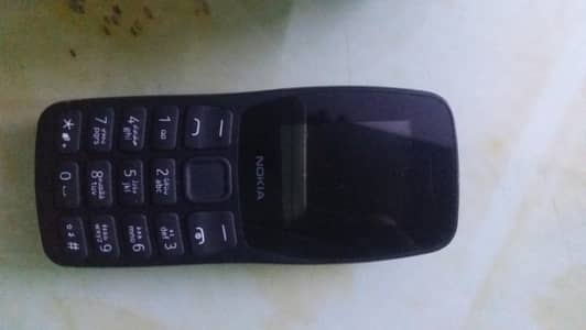 nokia 105 sealed set good condition handsfree and charger only