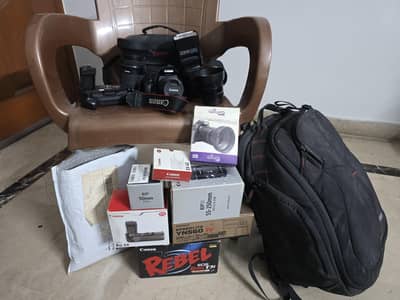 Canon EOS Rebel T3i (600D) + 3 Lens + Flashlight & All Accessories