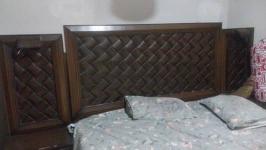 Double bed with wardrobe