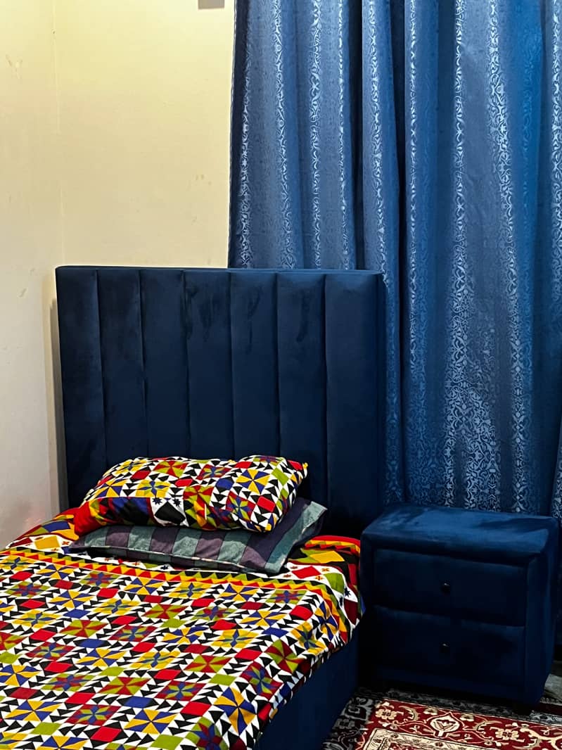 Two single bed sets with side tables 1
