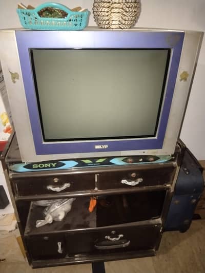 T. V with T. V Trali Sale karni ha jis ko chahye wo rabta kare Bilkul ok