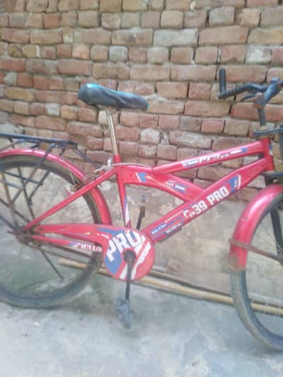 red full size bicycle