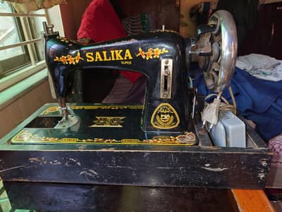 Salai machine with motor and pedal