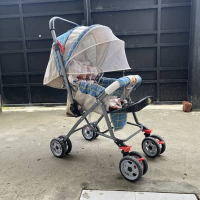Baby Stroller / Pram in Good Condition with Mosquito Net