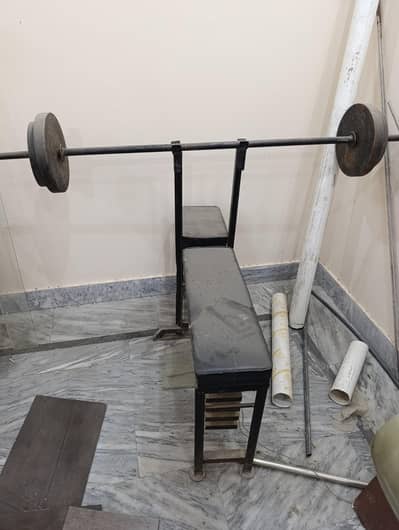 Home gym weight lifting bench set with plates