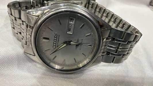 Title: Citizen Men's Wrist Watch – Good Condition