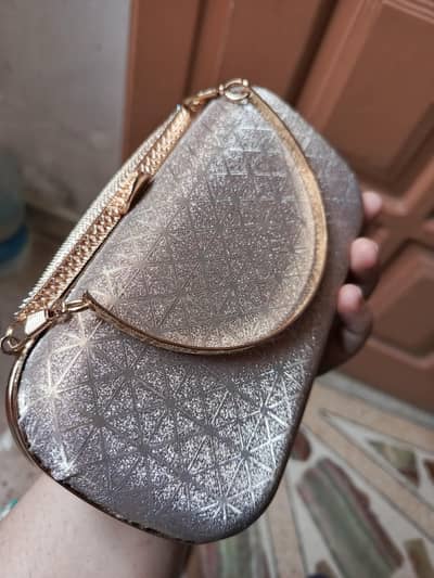 clutch beg only one time used new ka new he