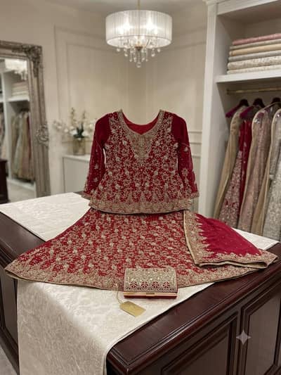 Red Heavy Bridal Lehengha/Peplum with Matching Clutch & Dupatta
