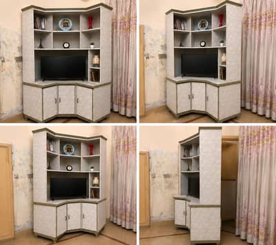 Corner entertainment center, corner TV wall unit, or corner hutch.