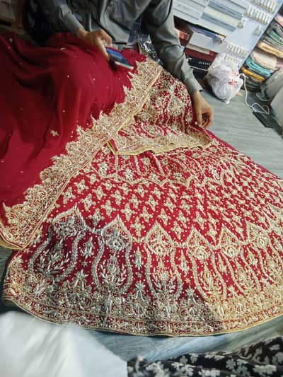 Almost New Red Heavy Embroidered Bridal Lehenga (Worn Only Once)