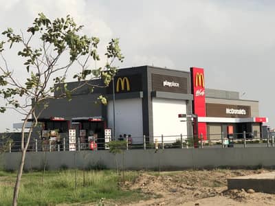 DHA PHASE 7 BLOCK Y 10 MARLA PLOT HOT LOCATION 100FT ROAD