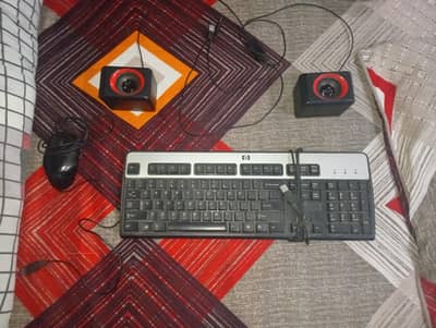 keyboard and mouse and speakers combo